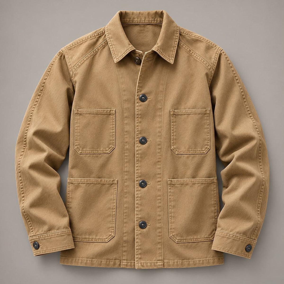 Front view of the khaki four-pocket chore coat laid flat