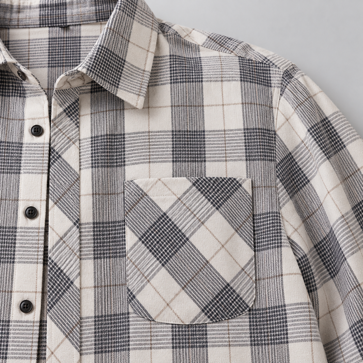 Ridgepine shirt chest pocket with diagonal plaid and dark front buttons