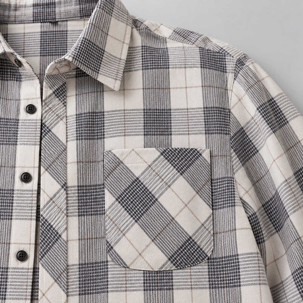 Ridgepine shirt chest pocket with diagonal plaid and dark front buttons
