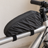 Black rain cover deployed over a Topeak TopLoader bag mounted on a silver bicycle top tube
