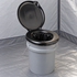 A clean Double Doodie inner bag fitted beneath the seat of a gray Luggable Loo portable toilet, with its empty lined opening visible; toilet sold separately.
