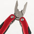 Close-up of the AceCamp multi tool plier jaws, spring and red handle pivots