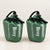 Two green packed bivy covers in drawstring pouches without whistles