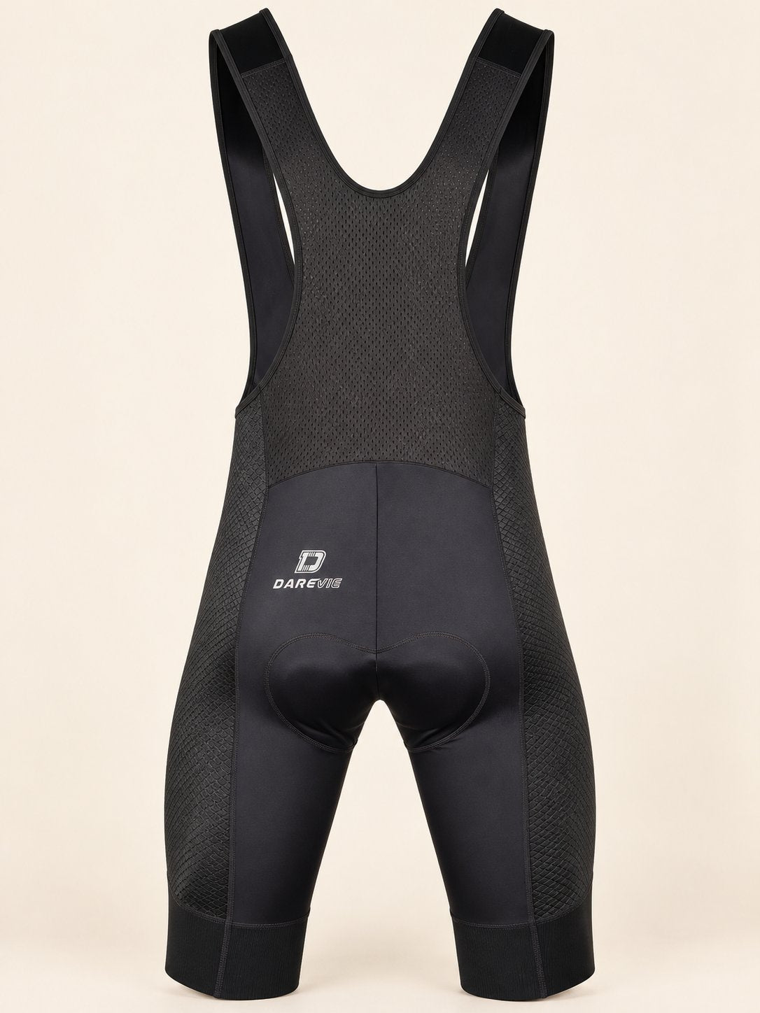 Back view of black DAREVIE DVP008 cycling bib shorts with mesh upper and shaped seat-pad seams