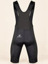 Back view of black DAREVIE DVP008 cycling bib shorts with mesh upper and shaped seat-pad seams