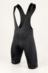 Front view of black DAREVIE DVP008 cycling bib shorts with mesh panels and broad leg bands