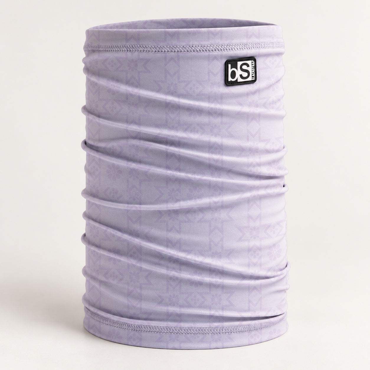 BlackStrap Dual Layer Tube in Windmill Dusk with a pale lavender geometric print.