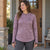 BlackStrap Women's Brackish Sun Hoody in Ferns Mauve, worn with the hood down.