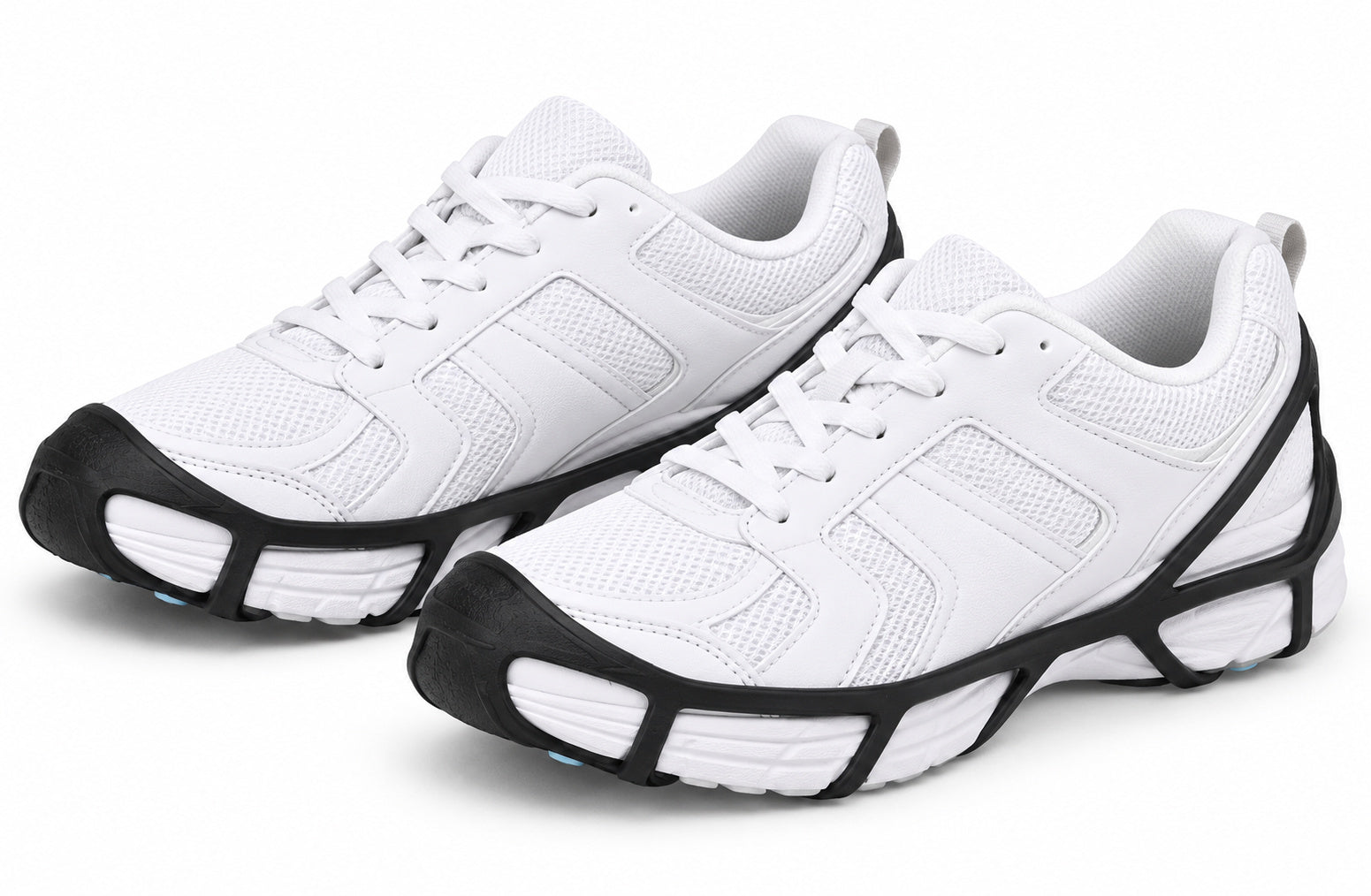 Black Due North Everyday G3 traction aids fitted over a pair of white athletic shoes.