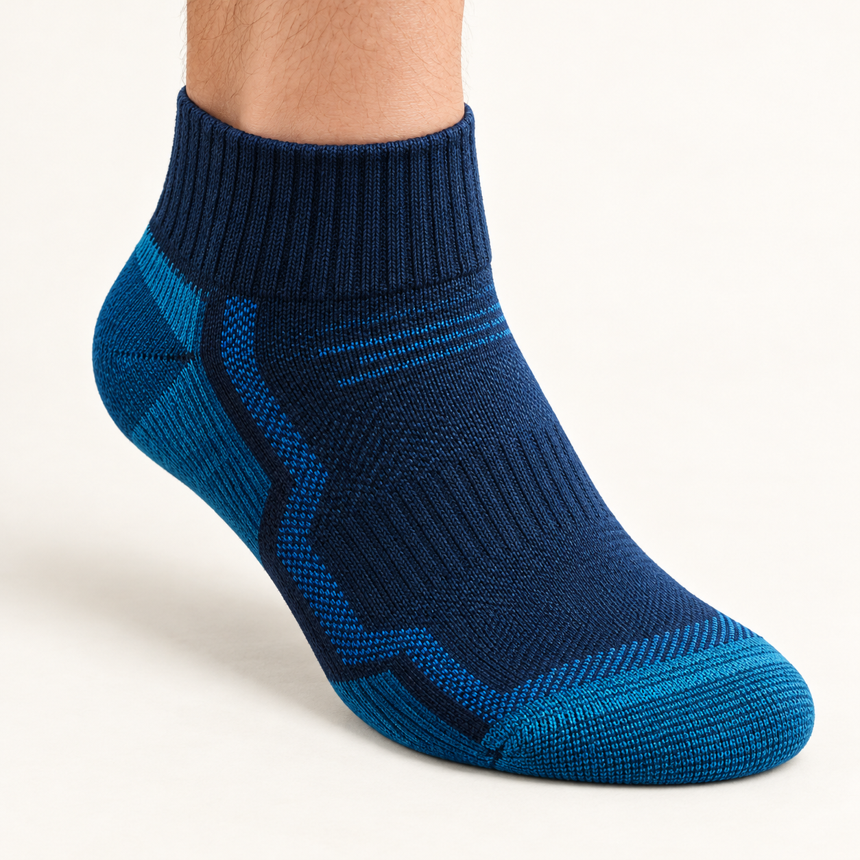 Blue WRELS ribbed mid-length socks with dark-navy cuff and blue/teal knit panels, ankle and arch detail