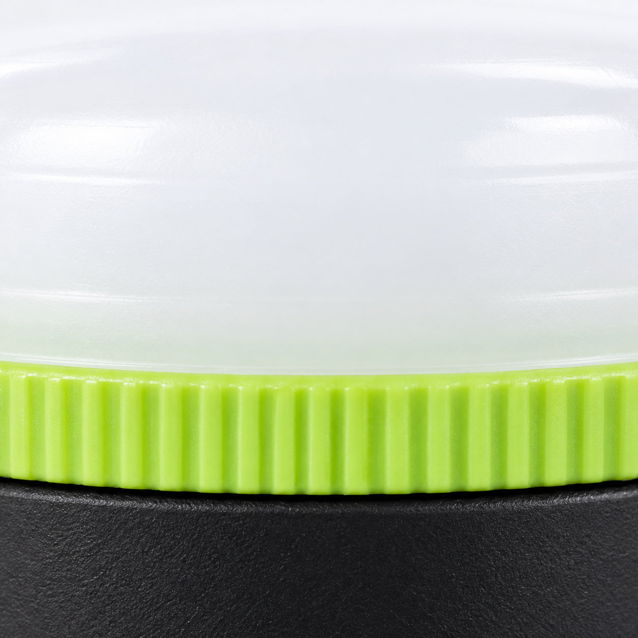 Close-up of the white diffuser and ribbed green ring on the LUXPRO LP1503 lantern