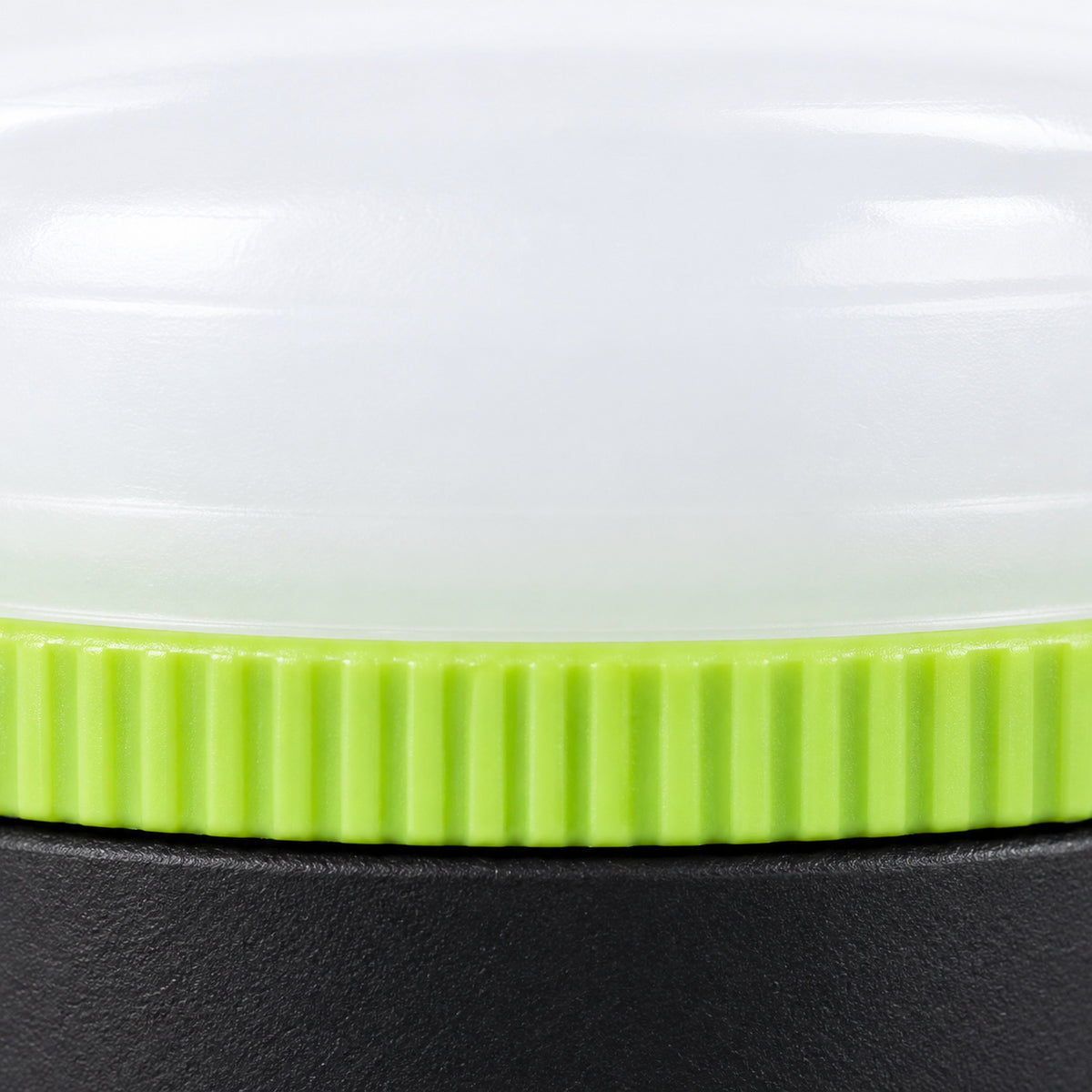 Close-up of the white diffuser and ribbed green ring on the LUXPRO LP1503 lantern