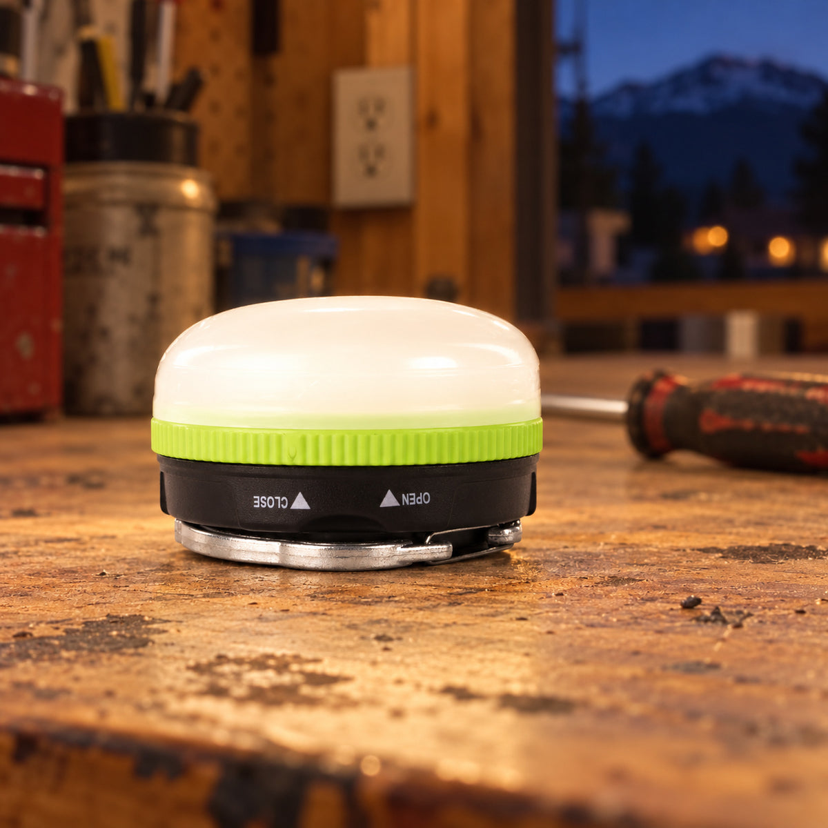 LUXPRO LP1503 mini lantern providing diffused light on a garage workbench