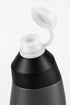 White pull-up drinking spout with its round dust cover open on the black bottle cap