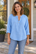BOXDAQ Everyday Button-Neck Top - Women's in blue, worn with everyday clothing.