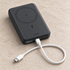 Black UGREEN PB561 magnetic power bank in a front studio view