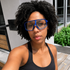 Outdoor selfie wearing the Blue SCVCN ApexShift clear-to-dark cycling glasses with the matching blue center bridge